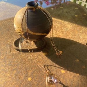 Touchstone Crystal rose gold extra long necklace with large silk crystal.